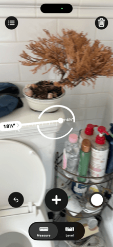 Before: the toilet set on the hexagonal floor tile