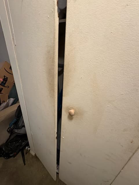 During: hanging the new closet bifold door